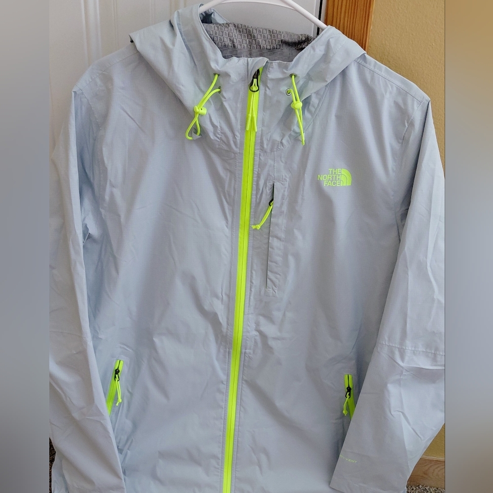 The North Face Light Blue Windbreaker with Neon Yellow Accents